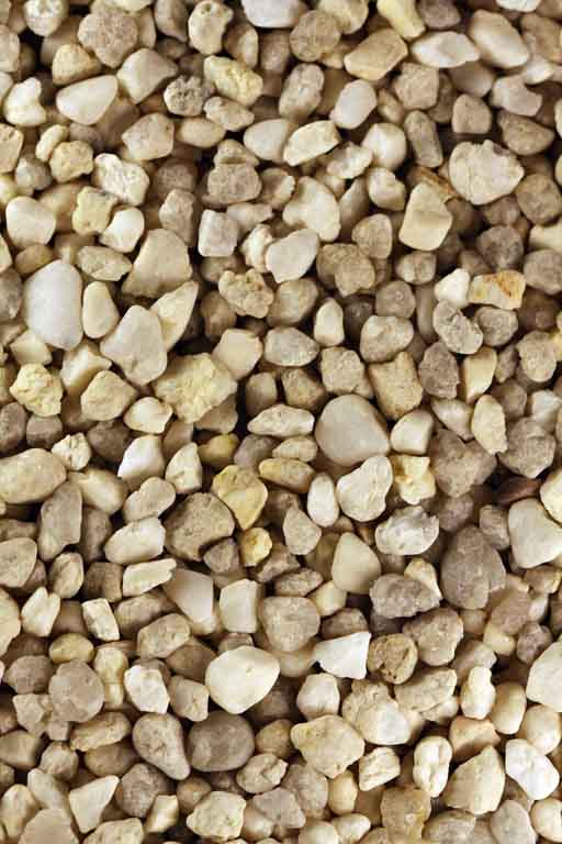 Colour photograph of white and brown round gravel